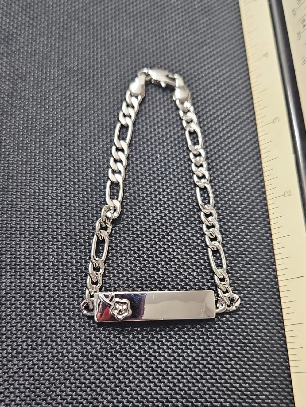 Silver Tone ID Bracelet with Flower Accent
